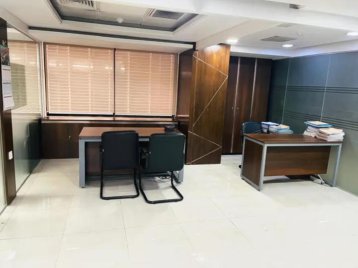 Executive cabin with walnut veneer paneling and custom joinery, completed by SAZ Commodities & Services